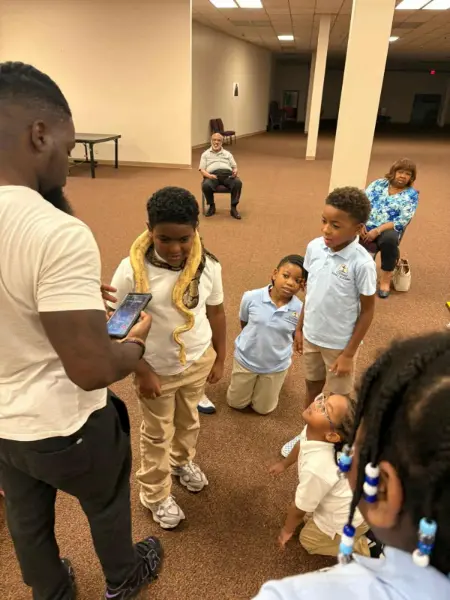 Educational school event with a snake